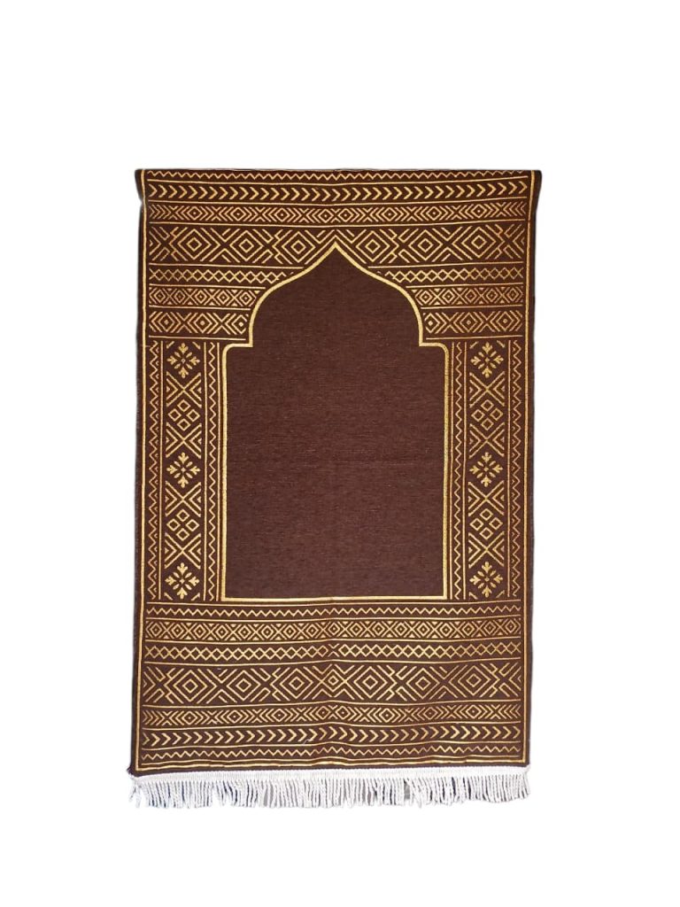 High-quality brown chenille prayer mat with a modern gold geometric pattern. This durable rug is a premium product from Sakakriya.id, a leading Indonesian prayer mat factory supplying bulk orders to wholesale distributors worldwide