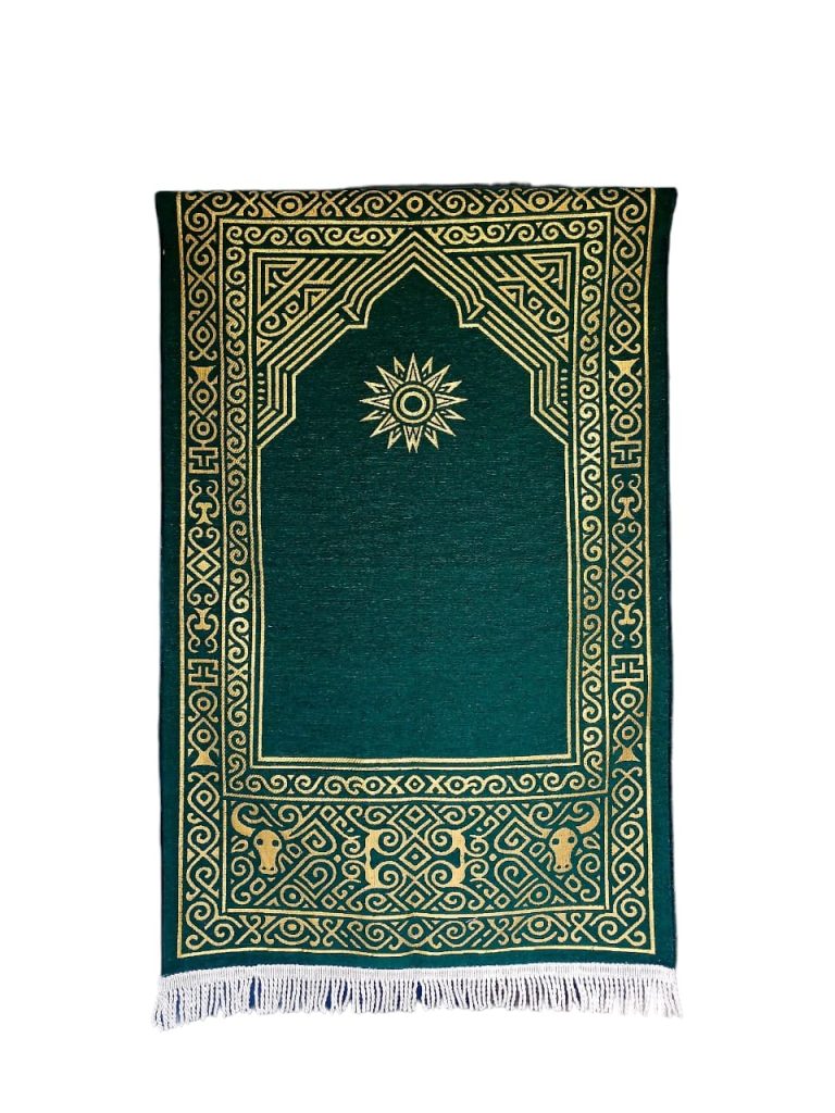 A luxurious dark green chenille prayer mat with an elegant gold embossed mihrab design. Manufactured by Sakakriya.id, a leading prayer rug supplier in Indonesia for wholesale and global export.